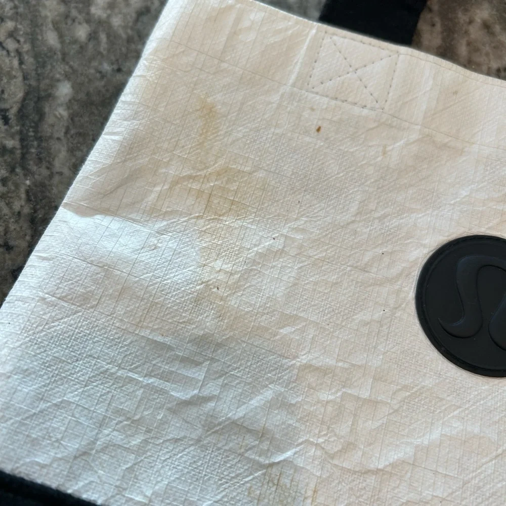lululemon athletica Black and Cream Tote has wear stains piling